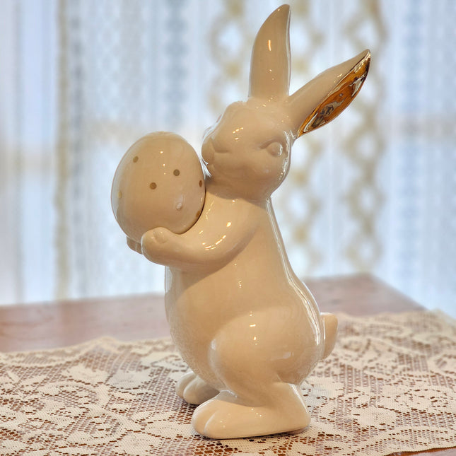 White Ceramic Bunny with Egg and Gold Accents