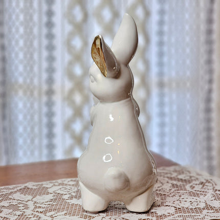 White Ceramic Bunny with Egg and Gold Accents