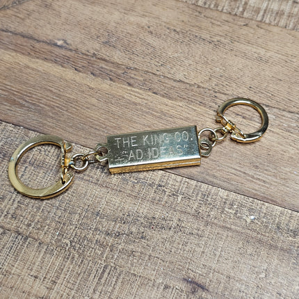 Vintage Gold-Toned Metal "The King Co. Bad Ideas" Kingsman-style Keychain